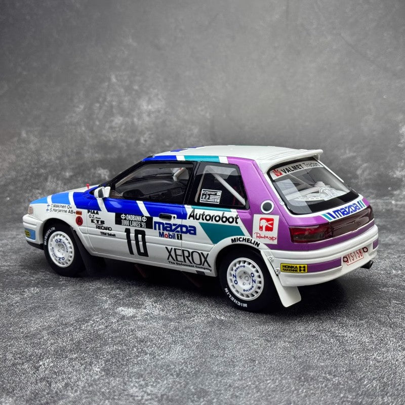 Mazda 323 GTX Gr. A #10 T. Mäkinen – 1991 1000 Lakes Rally (1:18 Scale Resin Model by OTTO, Limited Edition)(OT1099)