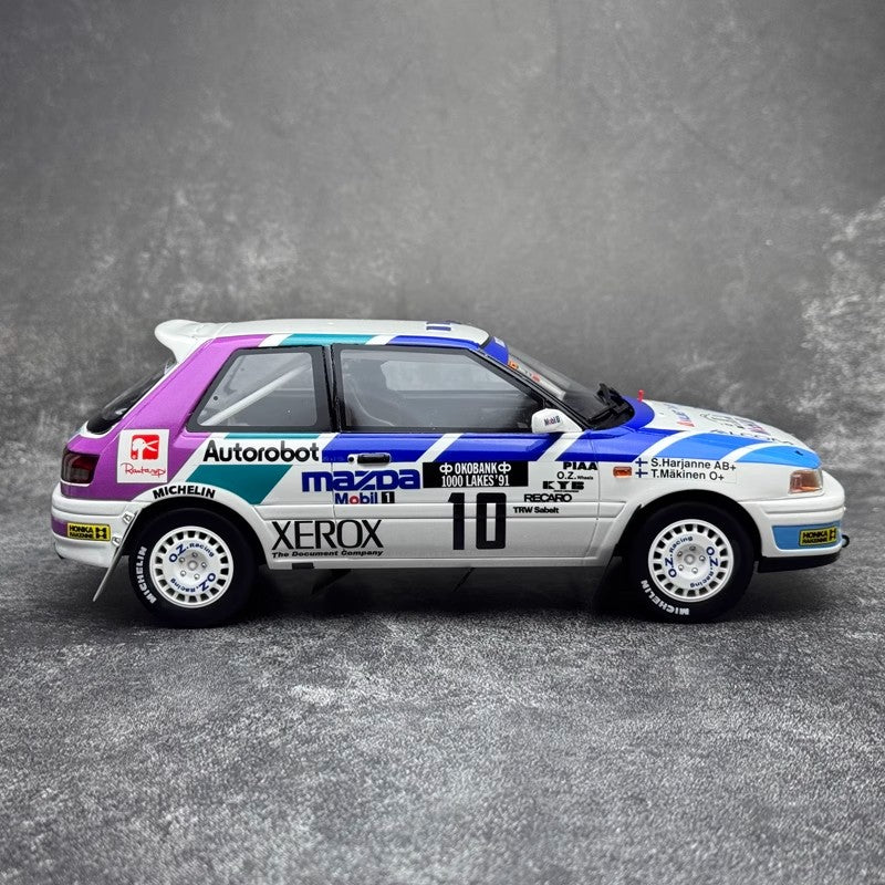 Mazda 323 GTX Gr. A #10 T. Mäkinen – 1991 1000 Lakes Rally (1:18 Scale Resin Model by OTTO, Limited Edition)（OT1099）