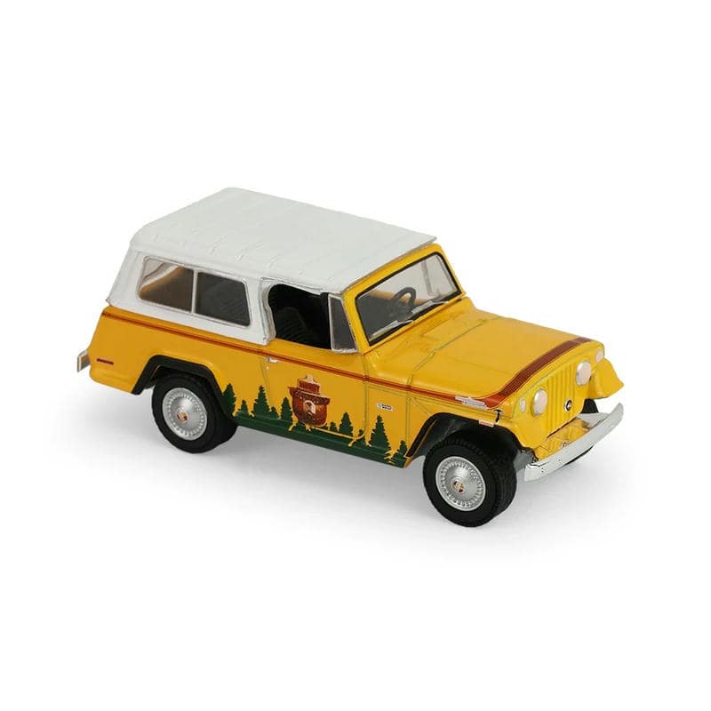 GreenLight 1:64 Smokey Bear Jeepster Commando Diecast Model
