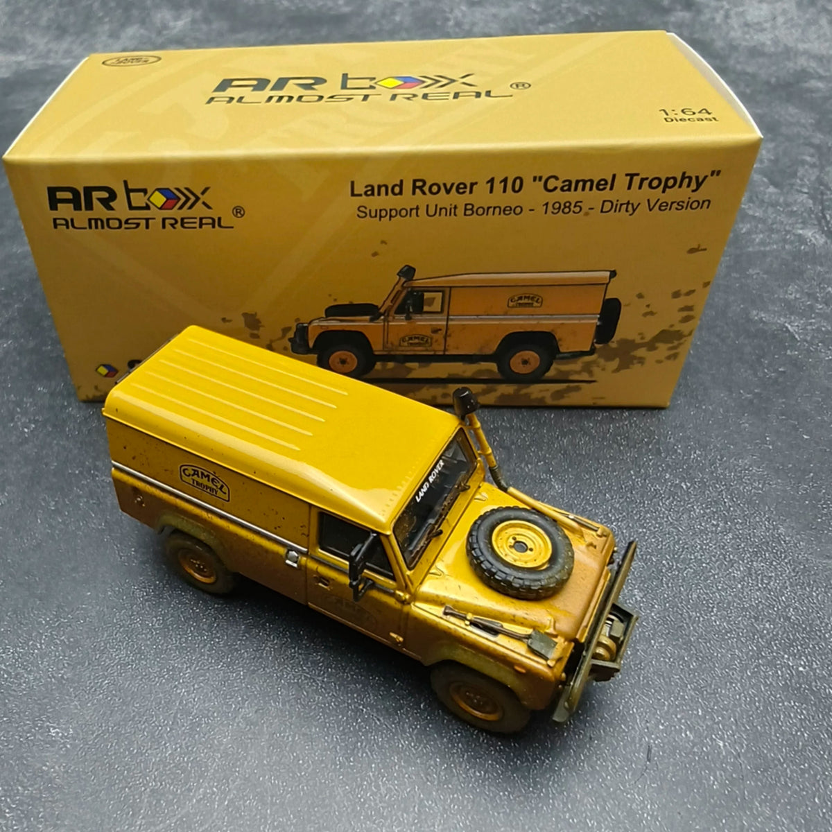 AR BOX 1:64 Land Rover Defender 110 Camel Trophy 1985 Borneo Support Vehicle Dirty Edition Diecast Model Car