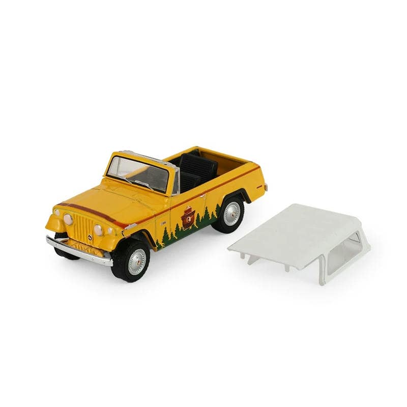 GreenLight 1:64 Smokey Bear Jeepster Commando Diecast Model
