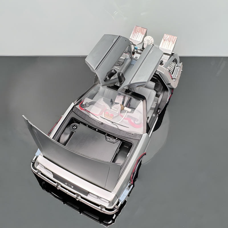 Back to the Future II DeLorean Time Machine –Hot Wheels 1/18 Scale Interactive Movie Car Model with Lights, Sound & Accessories