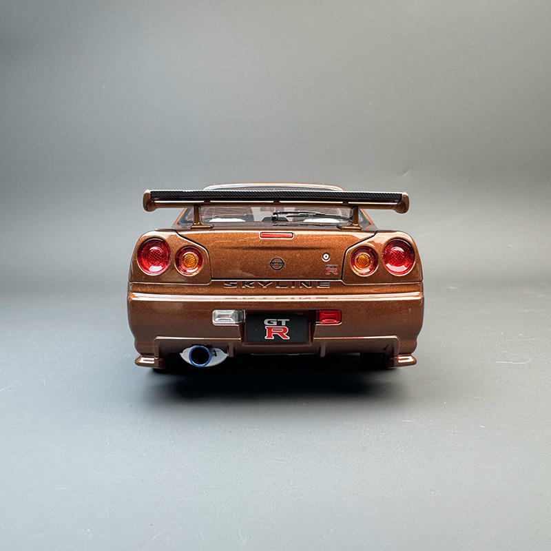 MotorHelix 1:18 Nissan GT-R R34 Metallic Bronze Diecast Car